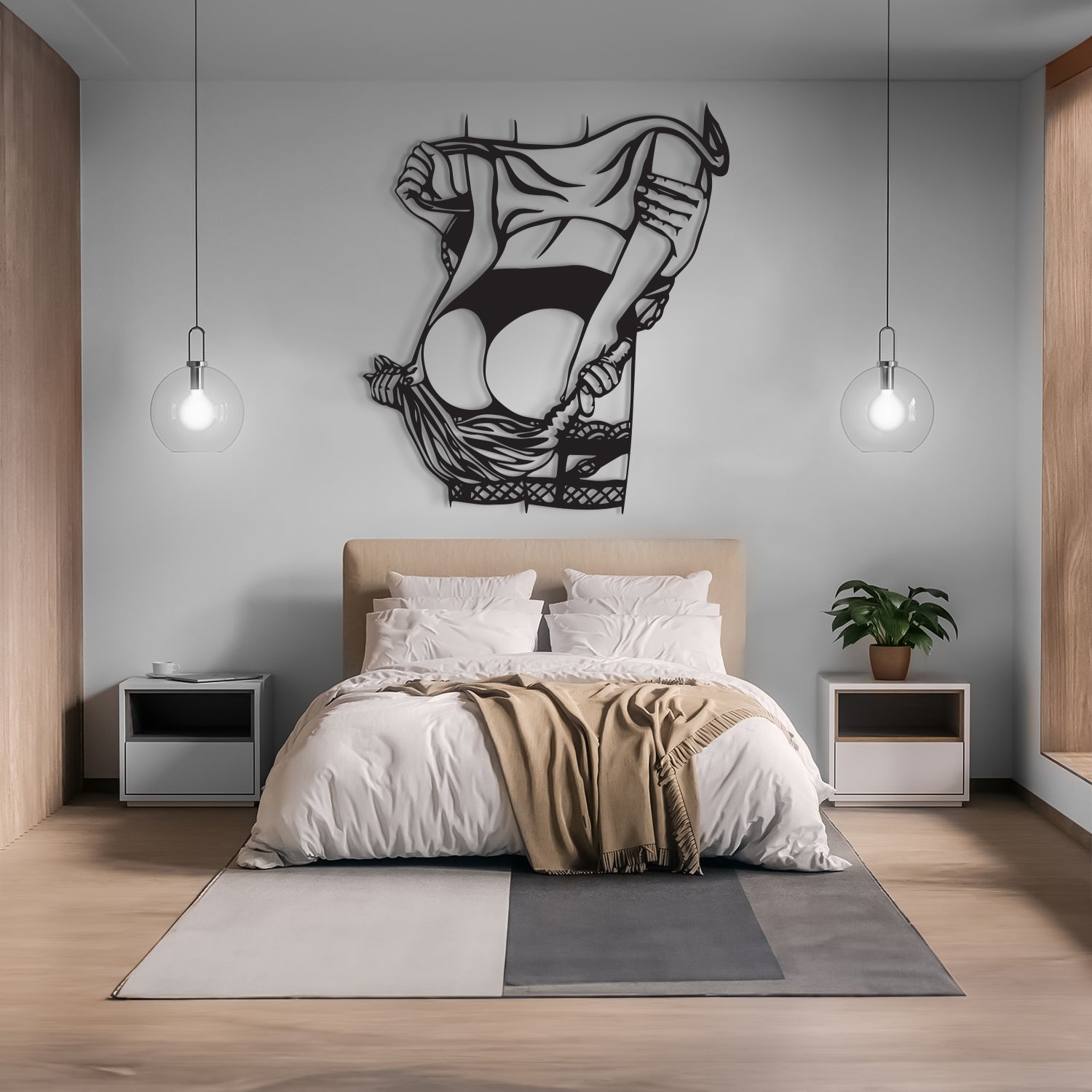 A modern bedroom with a bed dressed in white bedding and a beige throw blanket, flanked by two white nightstands with gray accents. A large black metal wall art piece depicting a stylized figure is mounted on the gray wall above the headboard.