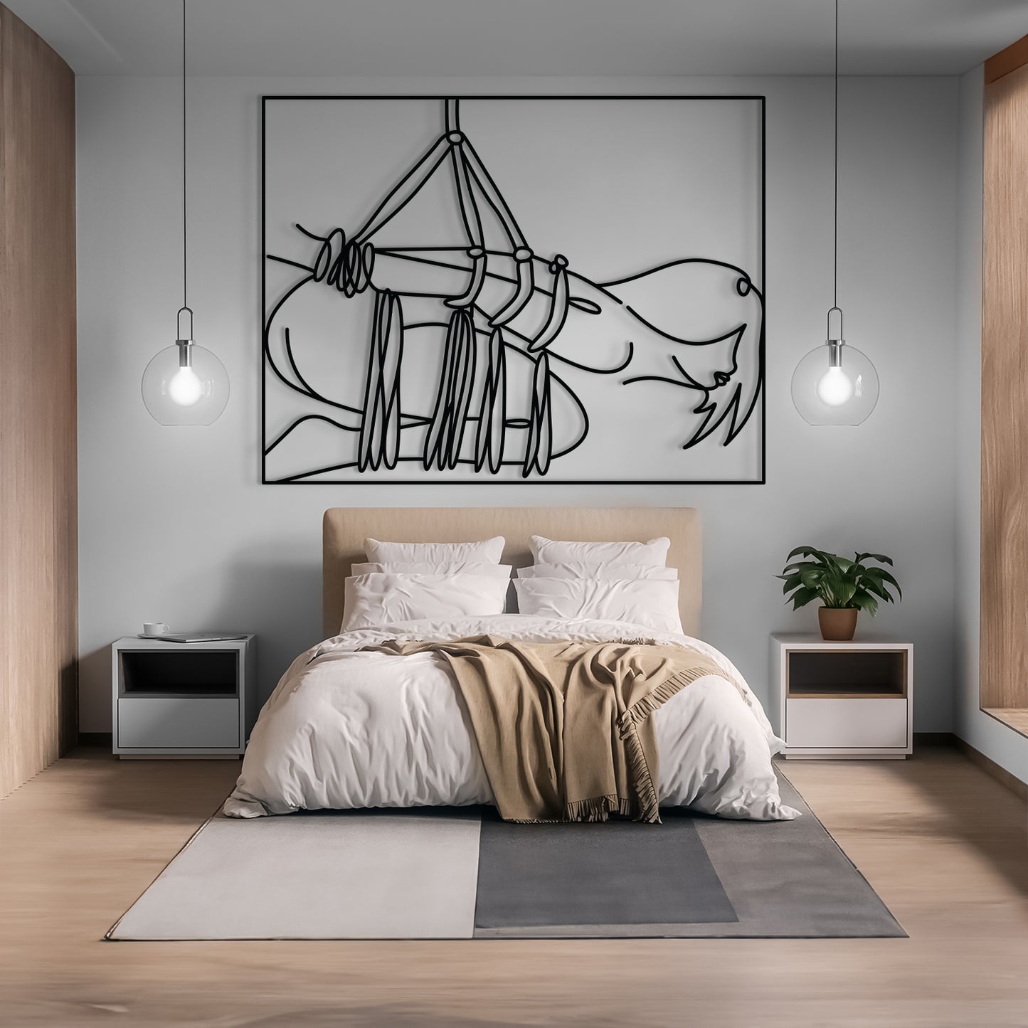 A modern bedroom featuring a large black line art wall sculpture of a hammock and face, mounted on a light gray wall above a bed with white linens and a beige throw blanket.