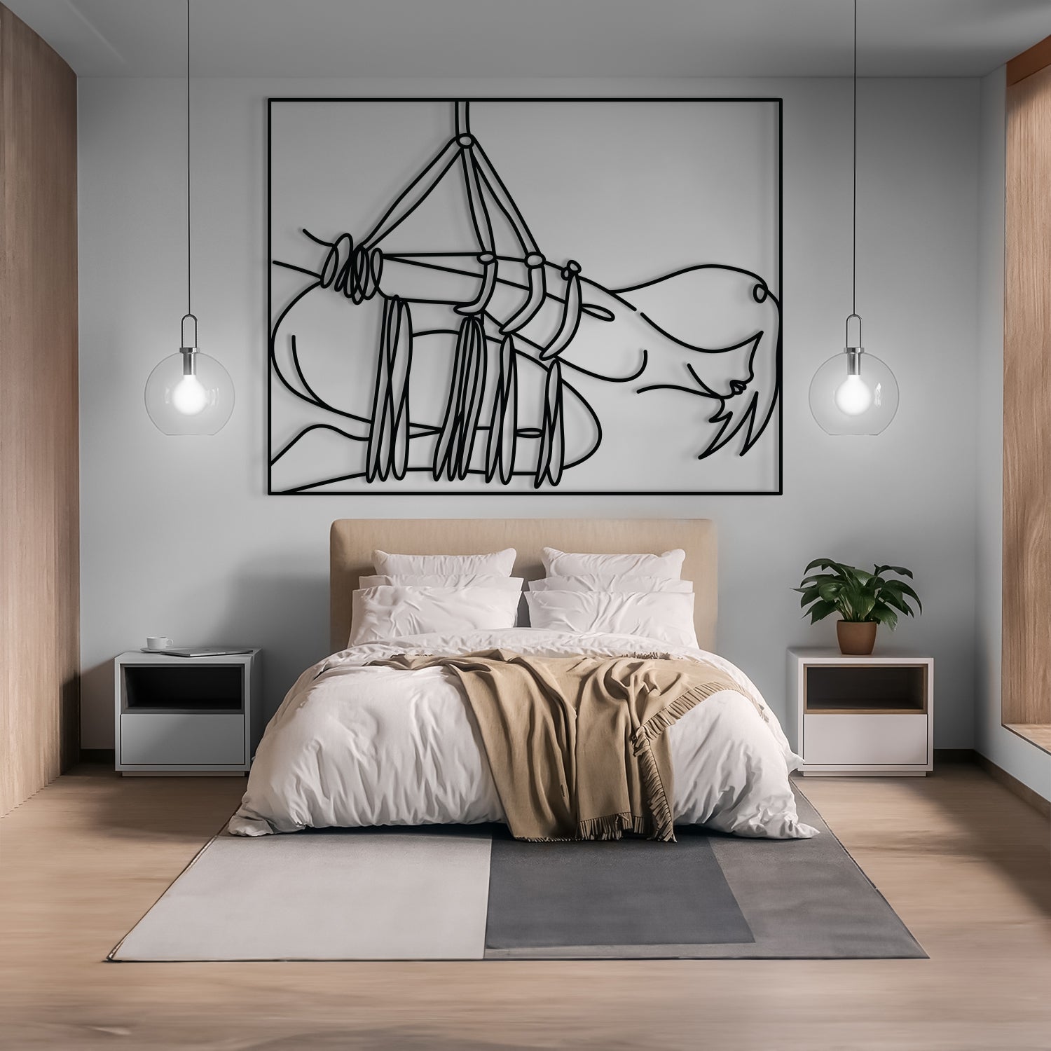 A modern bedroom featuring a large black line art wall sculpture of a hammock and face, mounted on a light gray wall above a bed with white linens and a beige throw blanket.