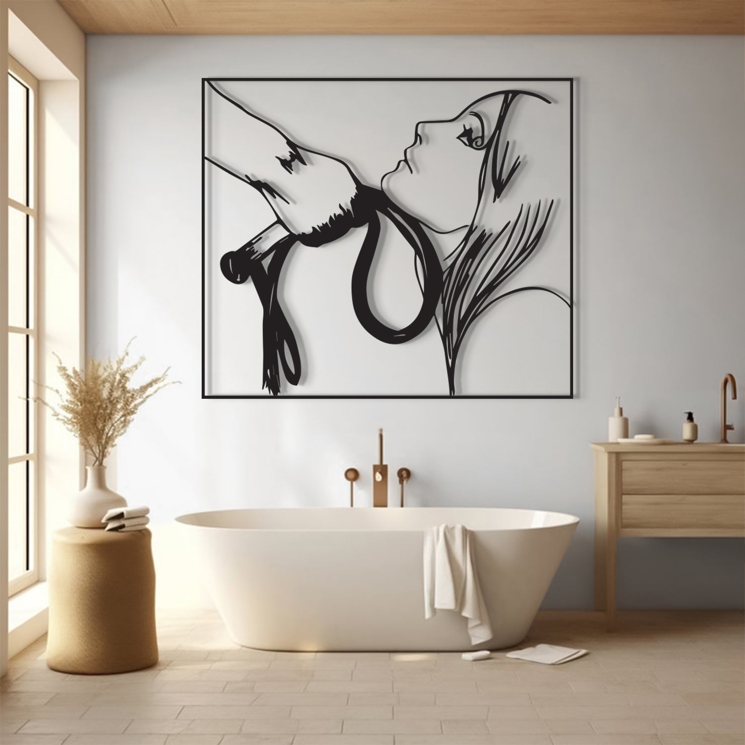 A large black and white minimalist wall art print depicting a woman with flowing hair, displayed in a modern bathroom above a freestanding white bathtub.