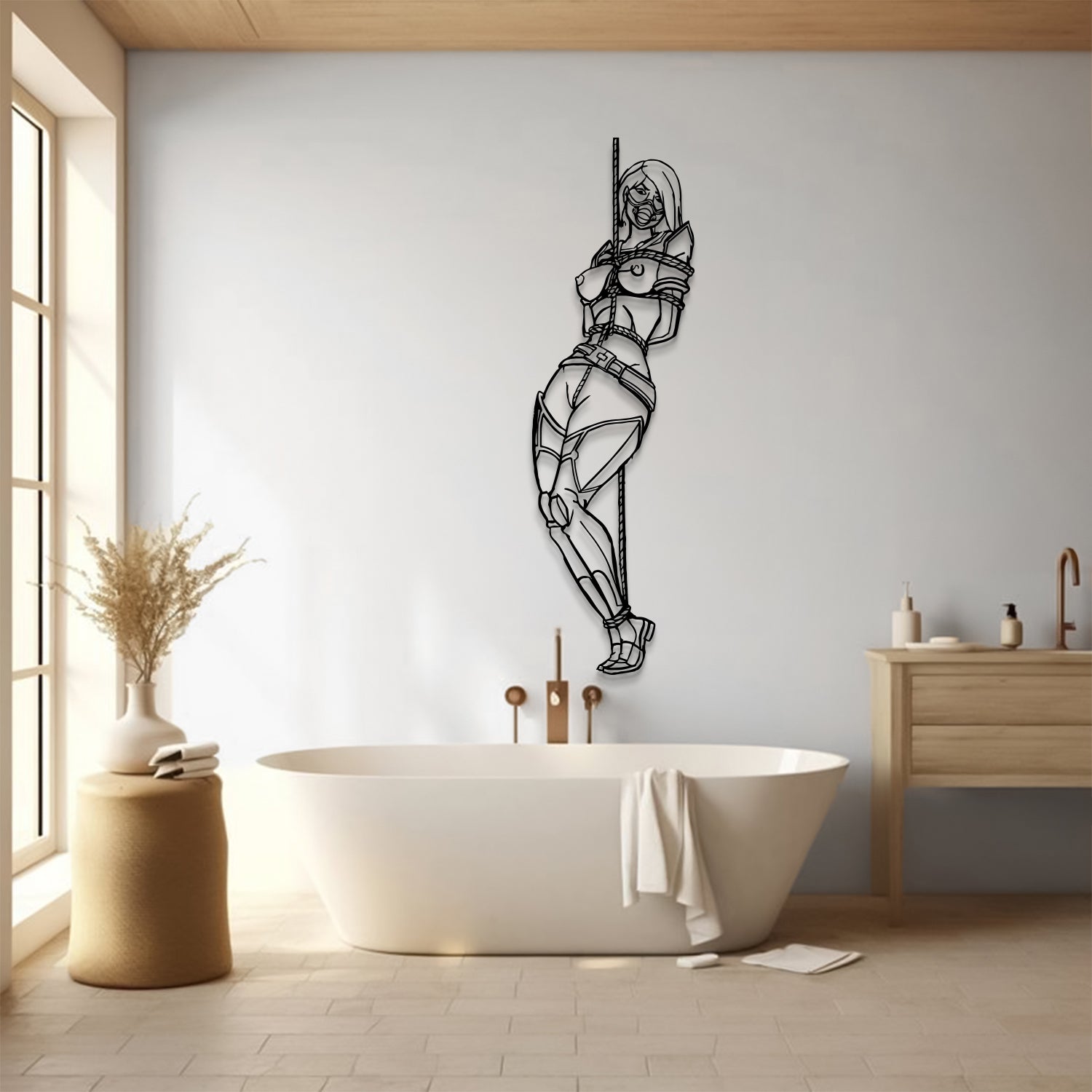 A black metal wall art piece depicting a woman bound and gagged hangs on a light gray wall above a white freestanding bathtub in a modern bathroom with wood flooring and a wooden vanity.