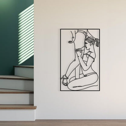 A black and white minimalist line art print of a woman sitting and tying her shoe, displayed on a white wall in a modern interior setting next to a staircase.