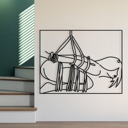 A minimalist black and white line art print of a woman in a hanging hammock, displayed on a white wall in a modern interior setting with a staircase and window blinds visible.