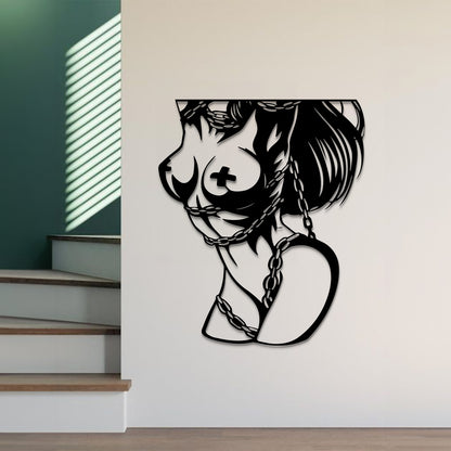 A black metal wall art piece depicting a stylized female profile with a cross on her chest and a chain around her neck, mounted on a white wall in an interior setting with stairs and window blinds visible.