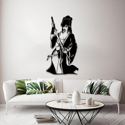 A black metal wall art piece depicting a female samurai warrior holding a sword, mounted on a light gray wall above a modern white sofa in a styled living room.