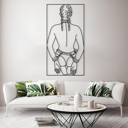 A modern living room scene featuring a large black and white minimalist line art print of a person with braided hair on the wall above a white sofa with green leaf-patterned pillows.