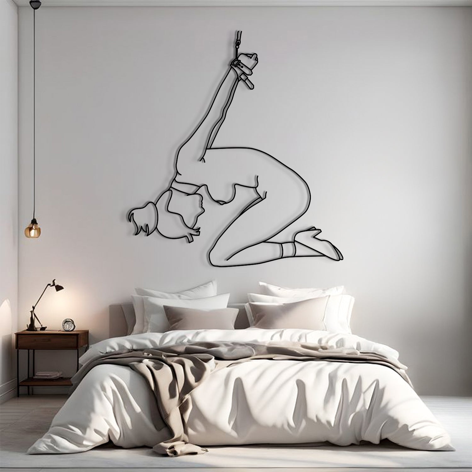 Bedroom with a wall decal of a dancer in a split pose.