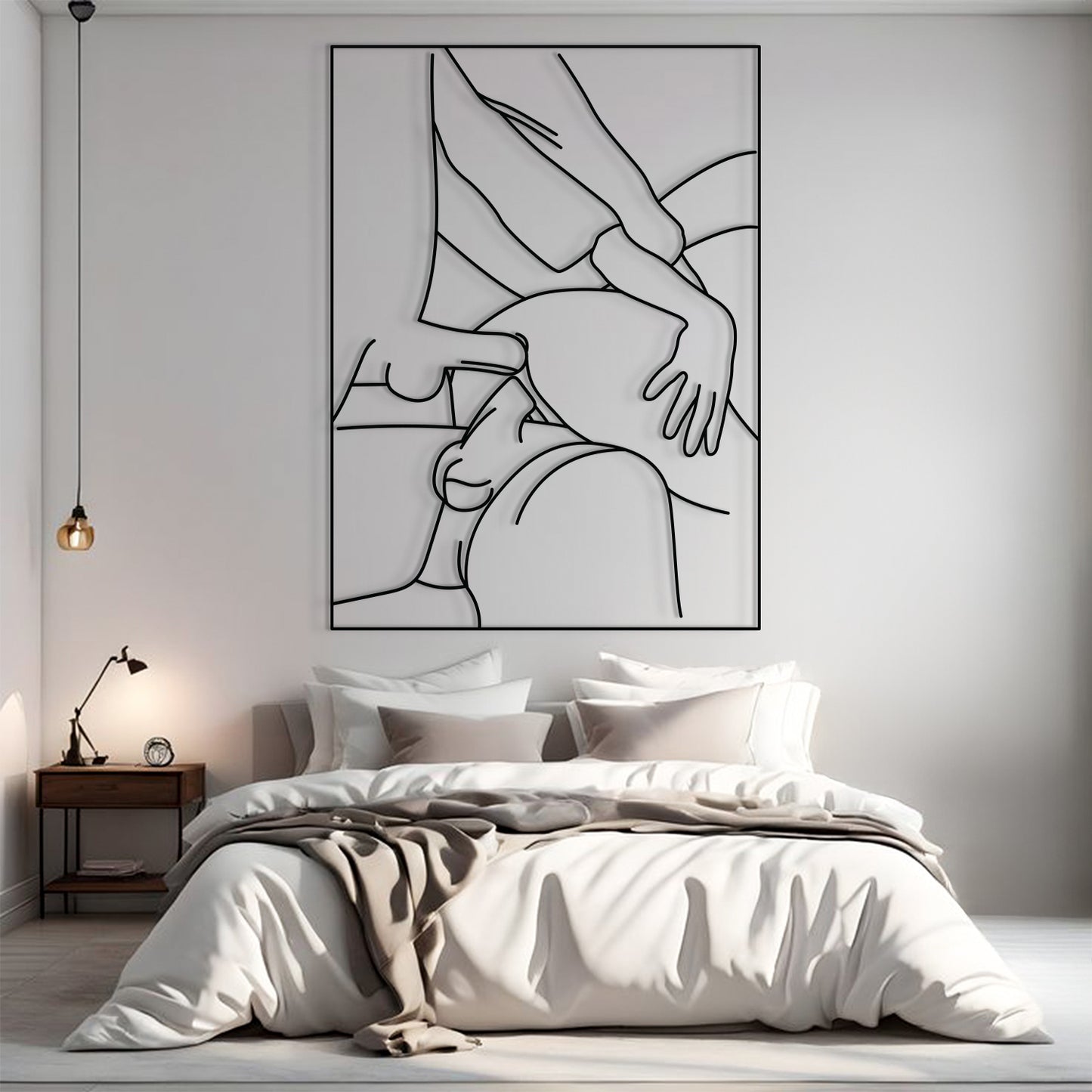 A minimalist black and white continuous line art poster of a couple, displayed on a light gray wall above a neatly made bed in a modern, softly lit bedroom.