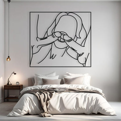 A minimalist black and white continuous line art wall print depicting a person holding their face, displayed above a neatly made bed in a modern, neutral-toned bedroom.