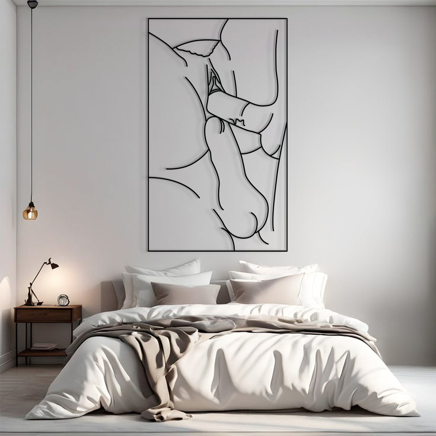 A minimalist black and white continuous line art print of a pregnant woman and baby, displayed on a light gray wall above a neatly made bed in a modern bedroom setting.