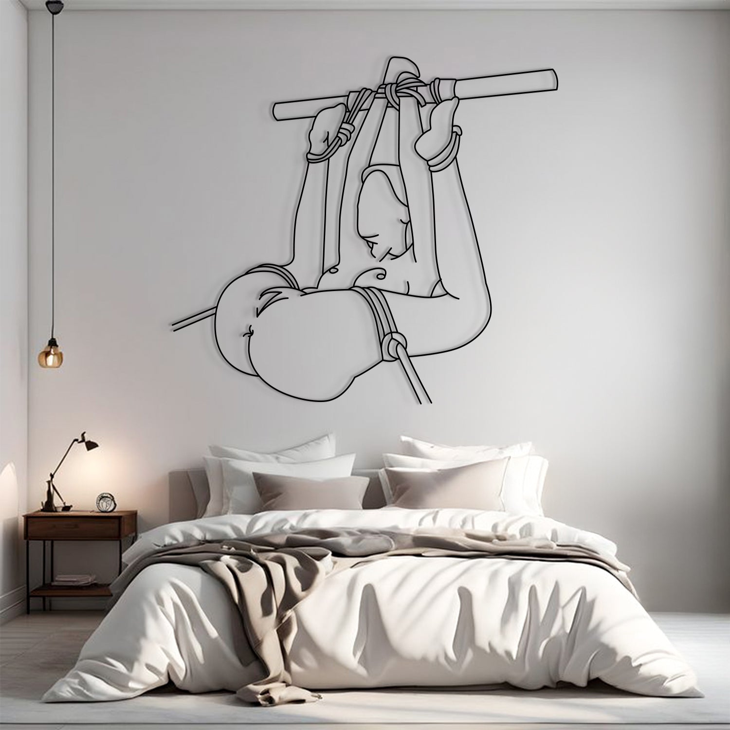 Bedroom with a large wall decal of a hammock and person, minimal decor.